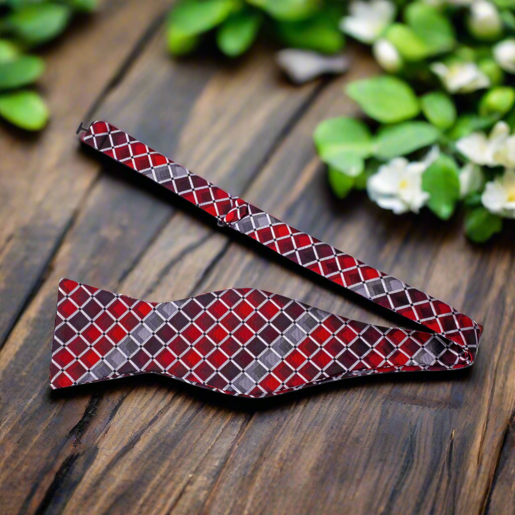 Model wearing the self-tie bow tie with a classic suit at a wedding