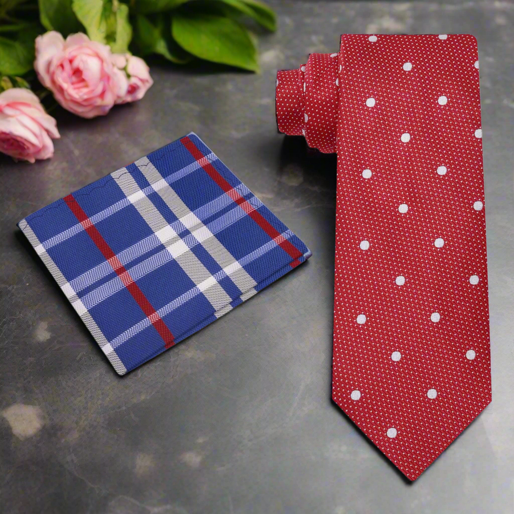 Close-up of a vibrant red polka dot necktie on a solid shirt