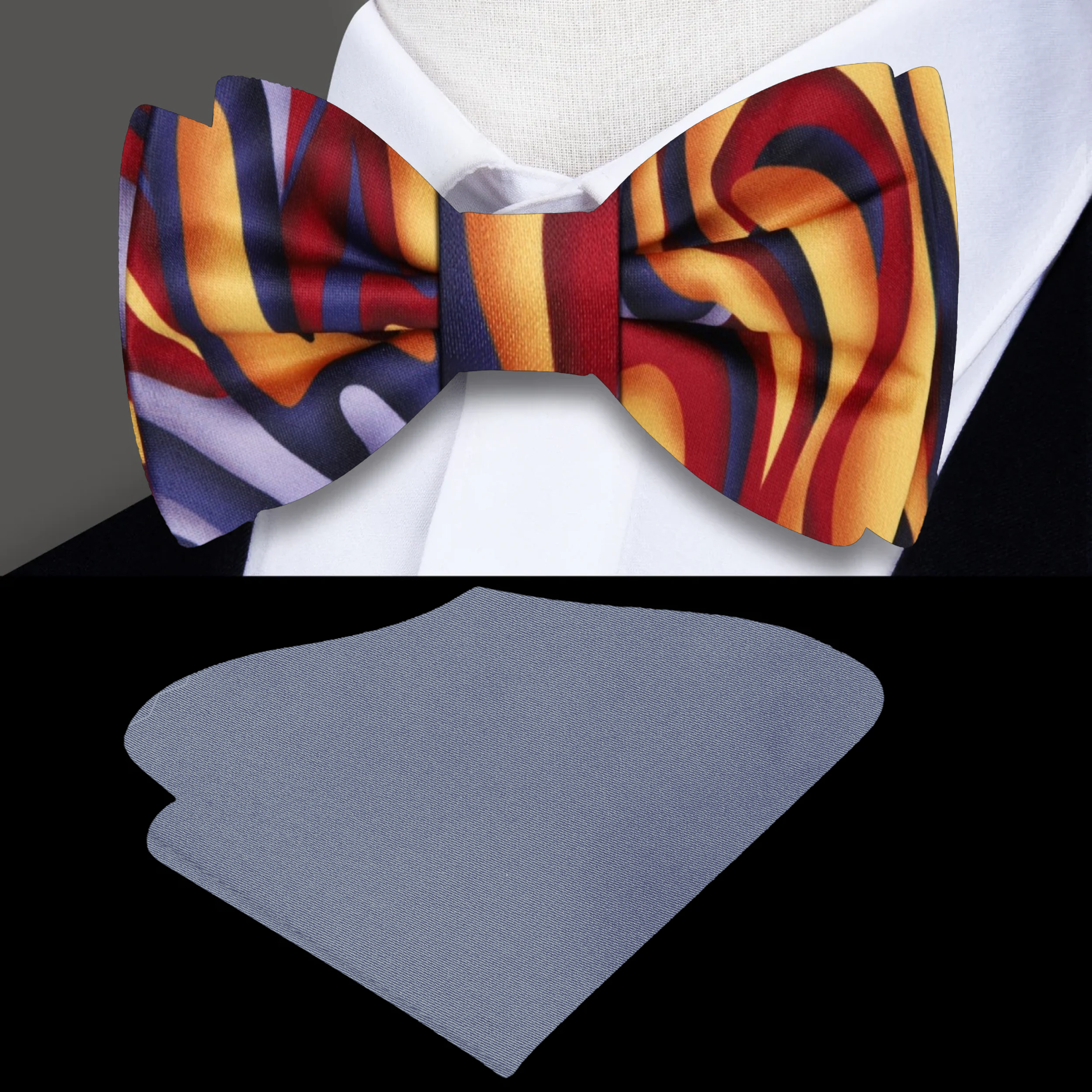 Styled with a charcoal grey suit, the vibrant bow tie adds a pop of color.