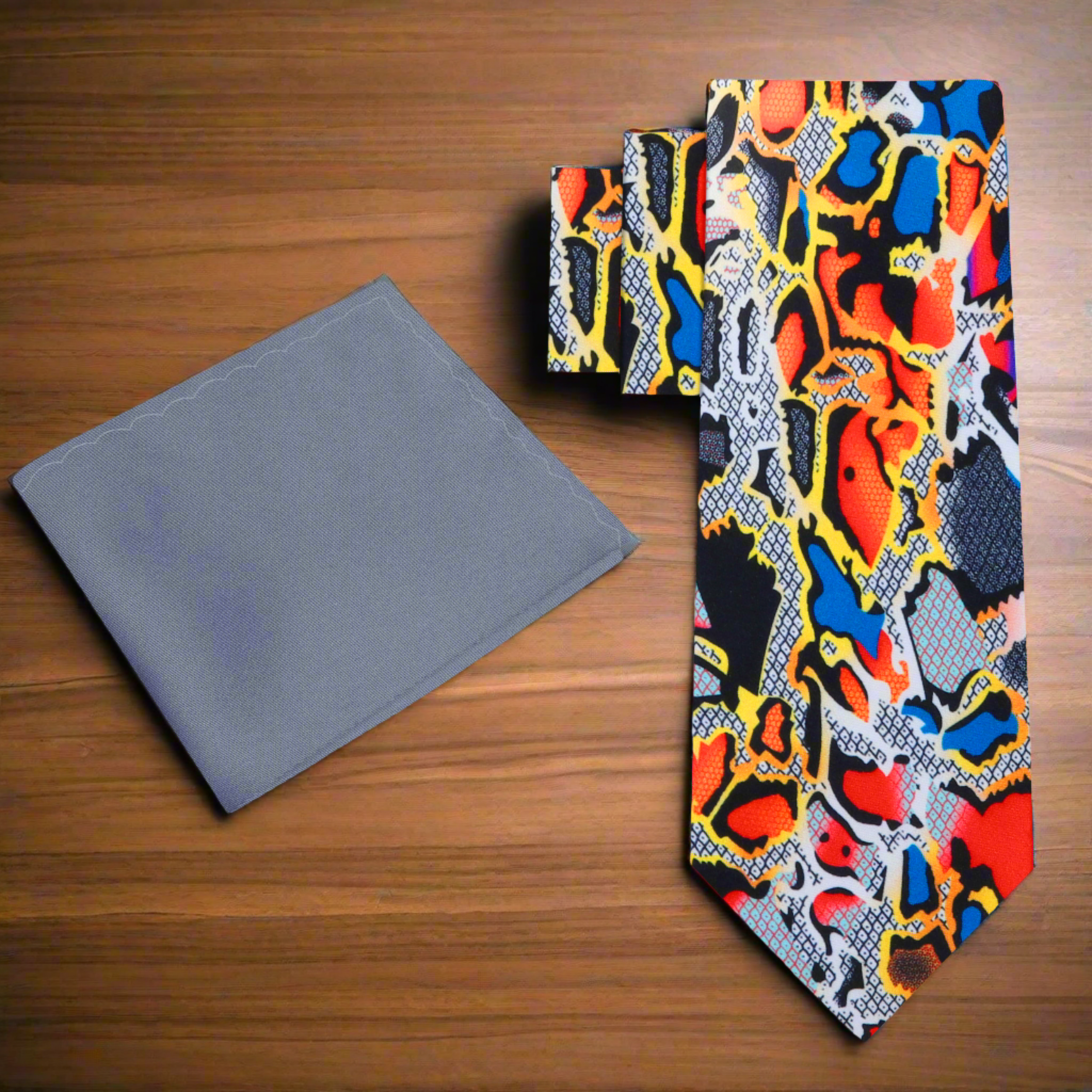 Stylishly paired vibrant snakeskin silk tie with a white dress shirt and charcoal suit.