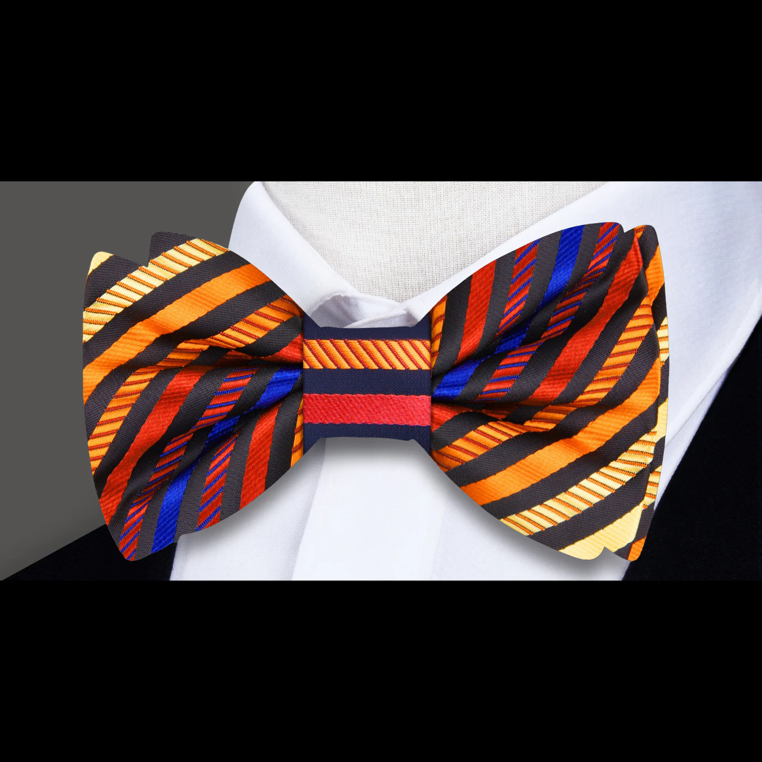 Man wearing stylish bow tie with suit at formal event