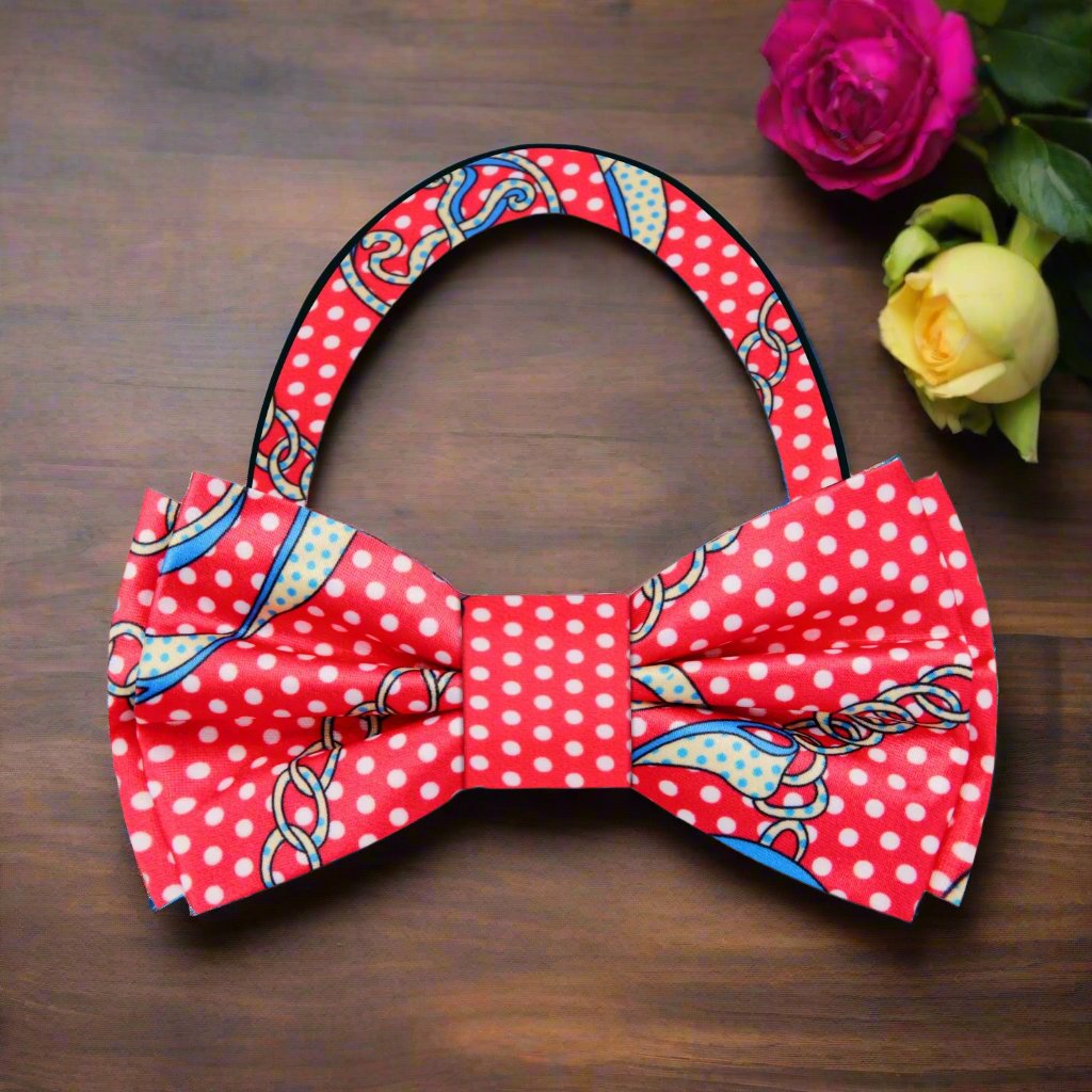 Model wearing a silk bow tie with playful patterns at a cocktail party
