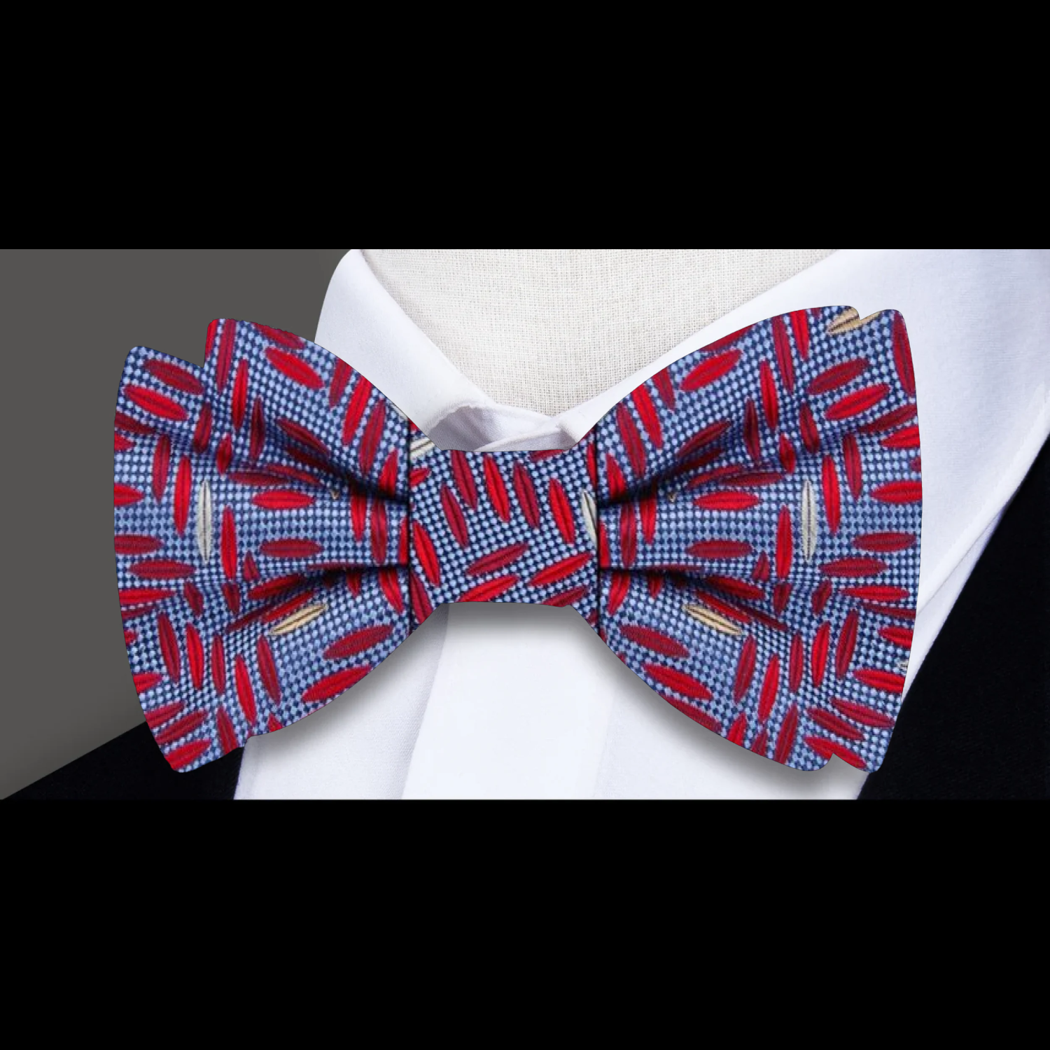 Styled with a crisp white shirt and navy suit for formal events