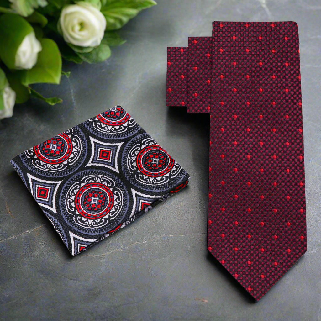 Close-up of dark red mens silk polka dot necktie with detailed pattern