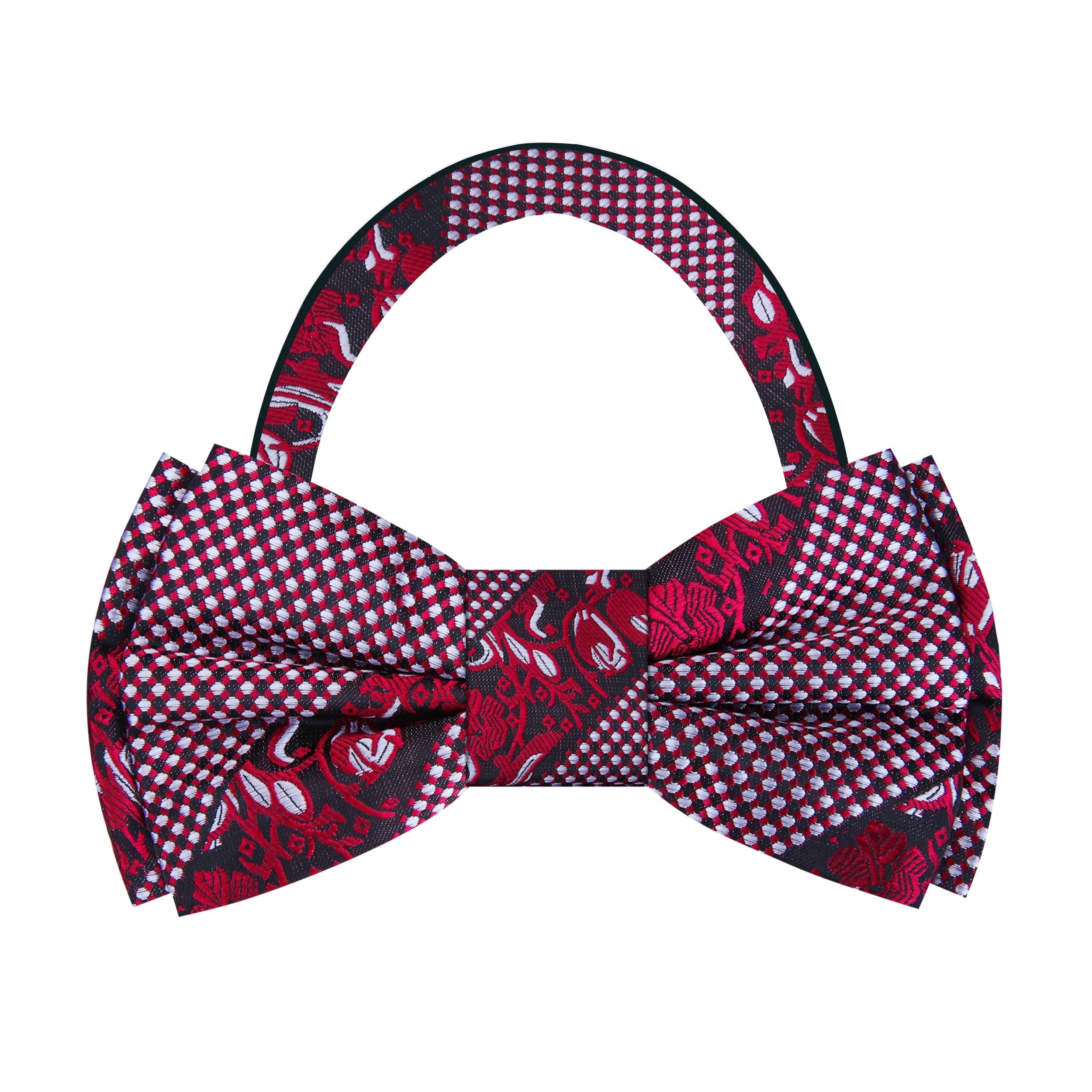 A child wearing the kids bow tie and pocket square set during a wedding ceremony.