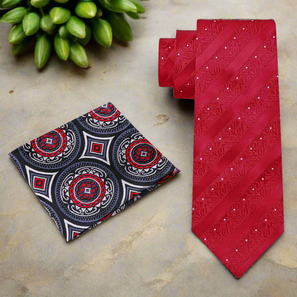 Close-up of the red neckties floral texture, highlighting its quality and sophistication.