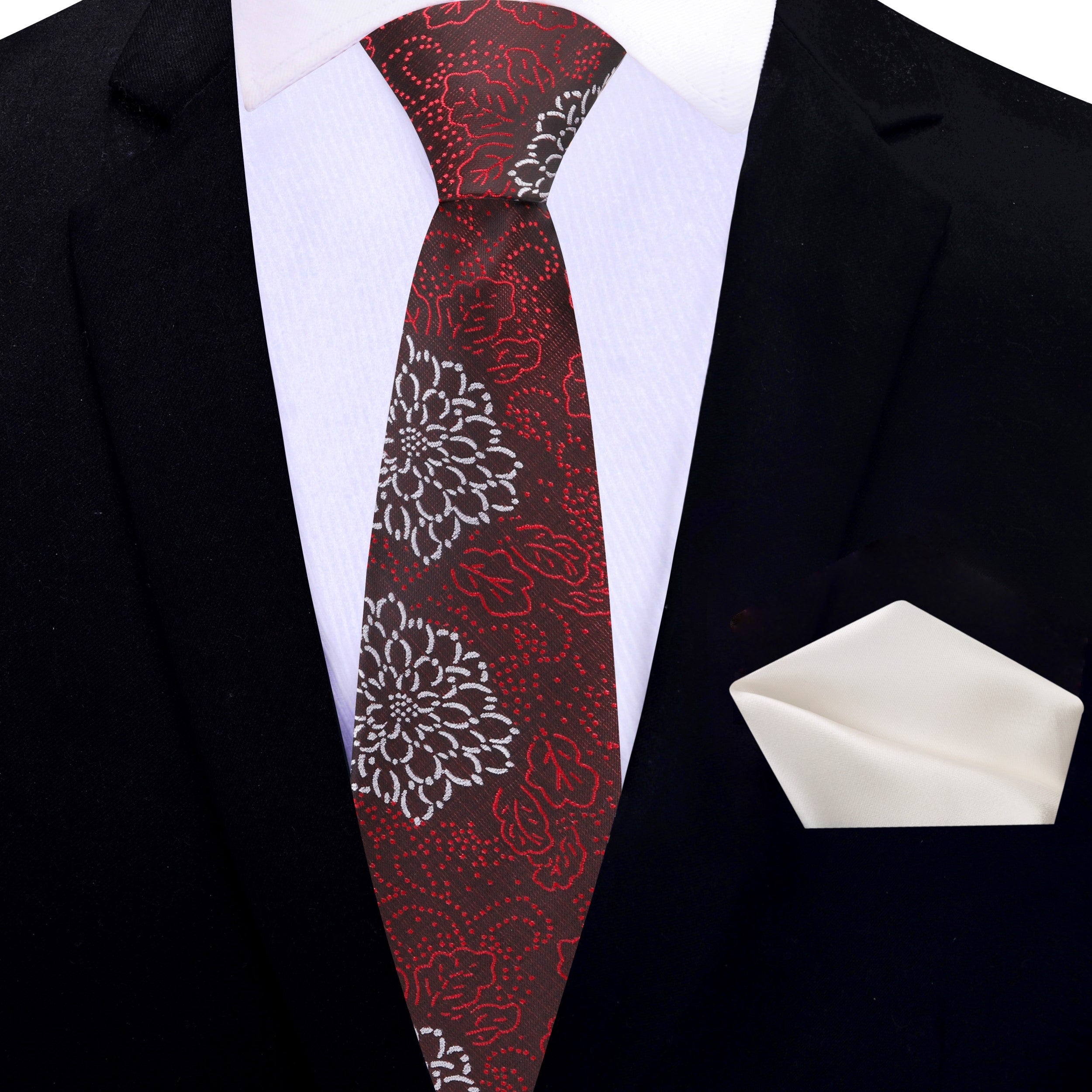 Zinnia floral necktie styled with a charcoal suit and white dress shirt.