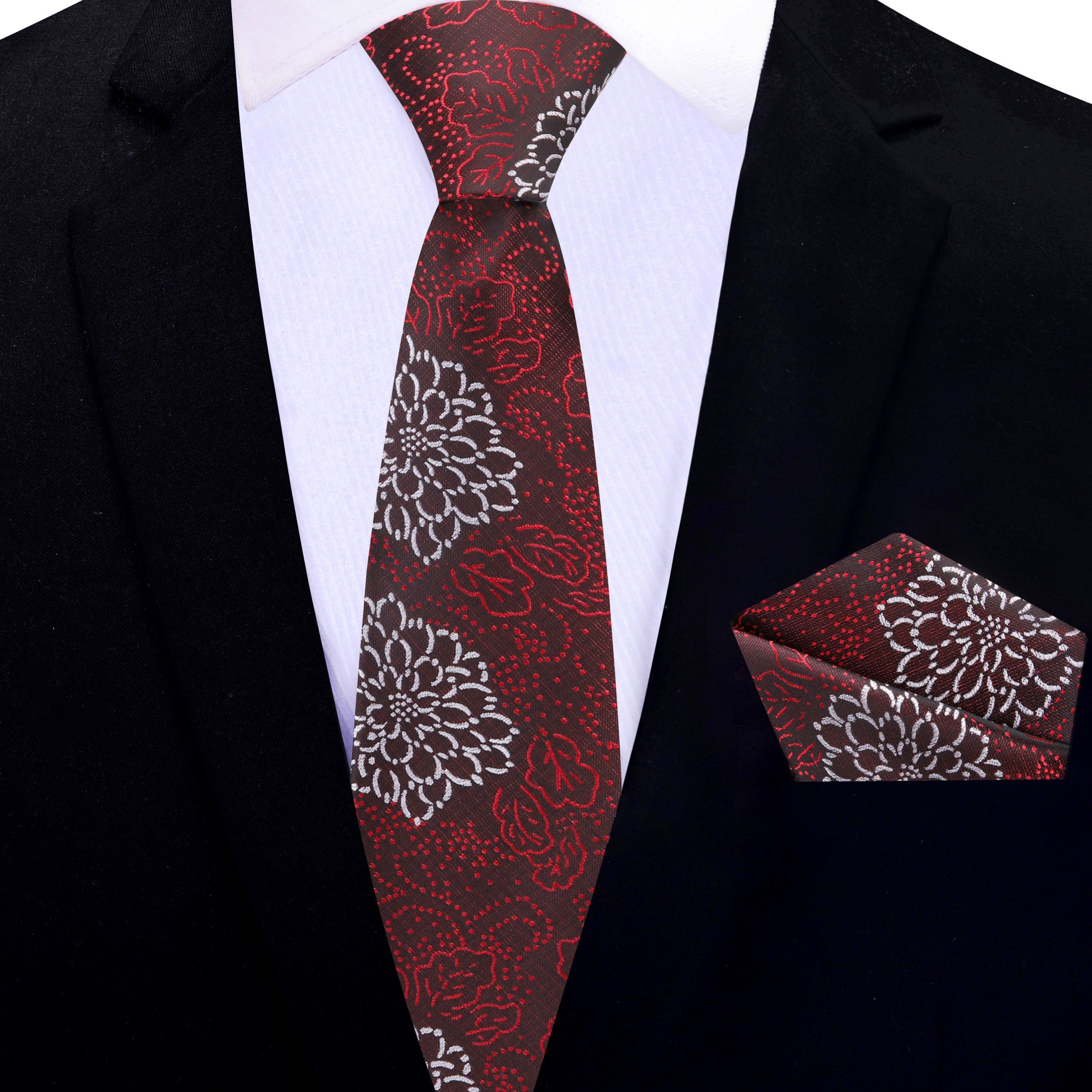 Zinnia floral necktie styled with a charcoal suit and white dress shirt.