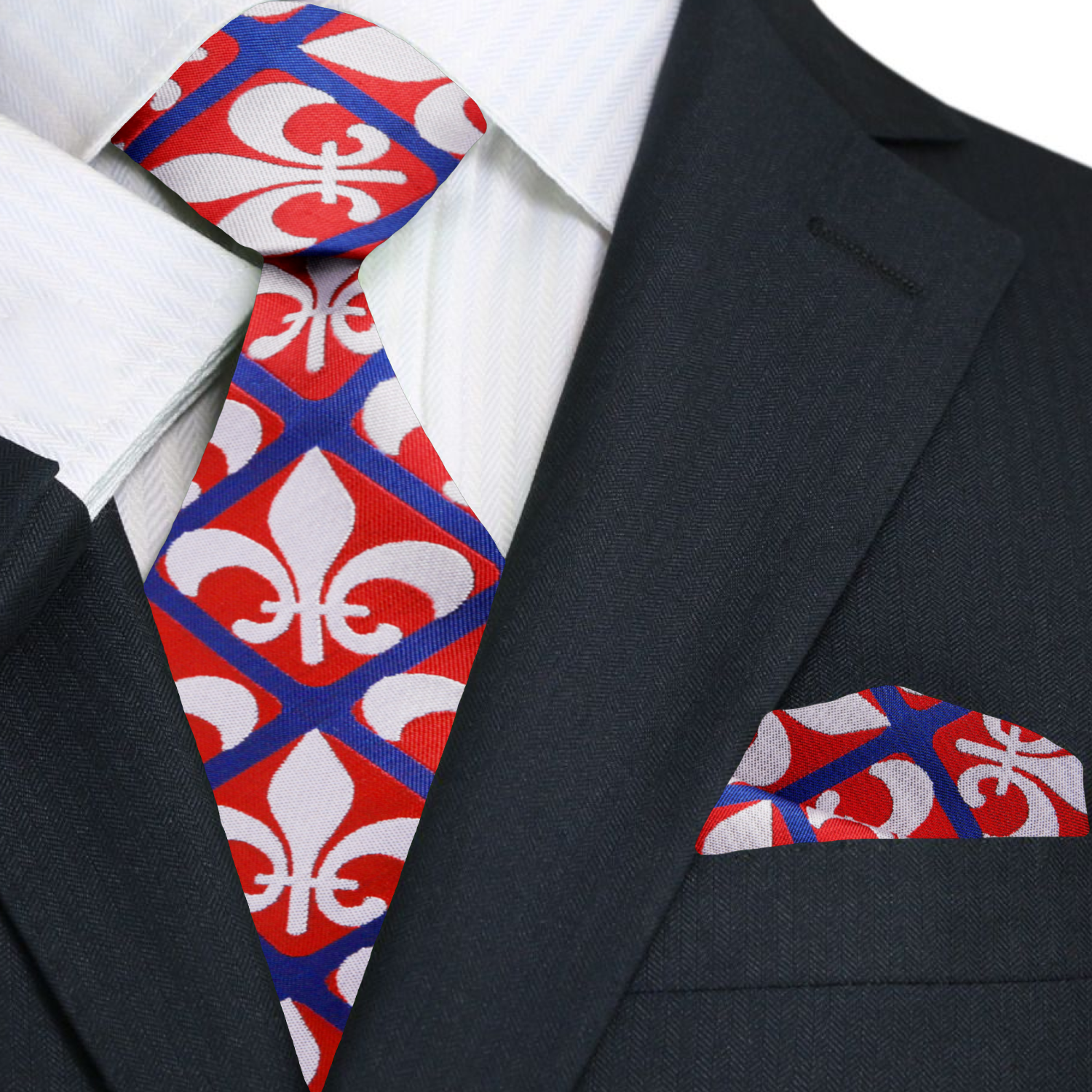 Close-up of fleur-de-lis tie and pocket square set on a wooden table.