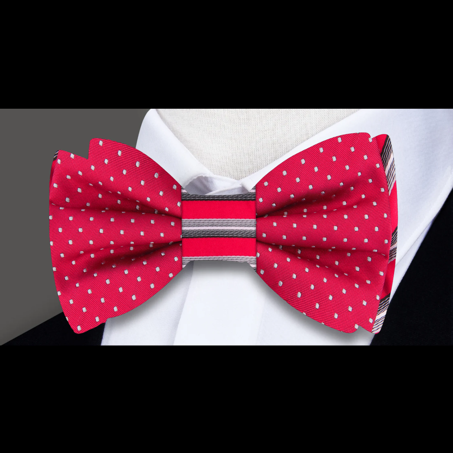 Vibrant red double-sided silk bow tie with white polka dots and grey stripes, perfect for special occasions.