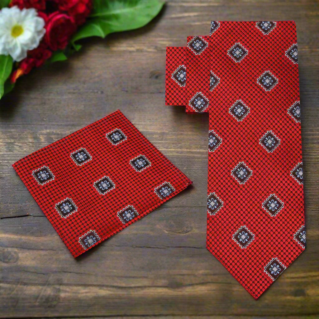Close-up view of the silk medallion tie, highlighting the intricate patterns and luxurious fabric, ideal for formal occasions.