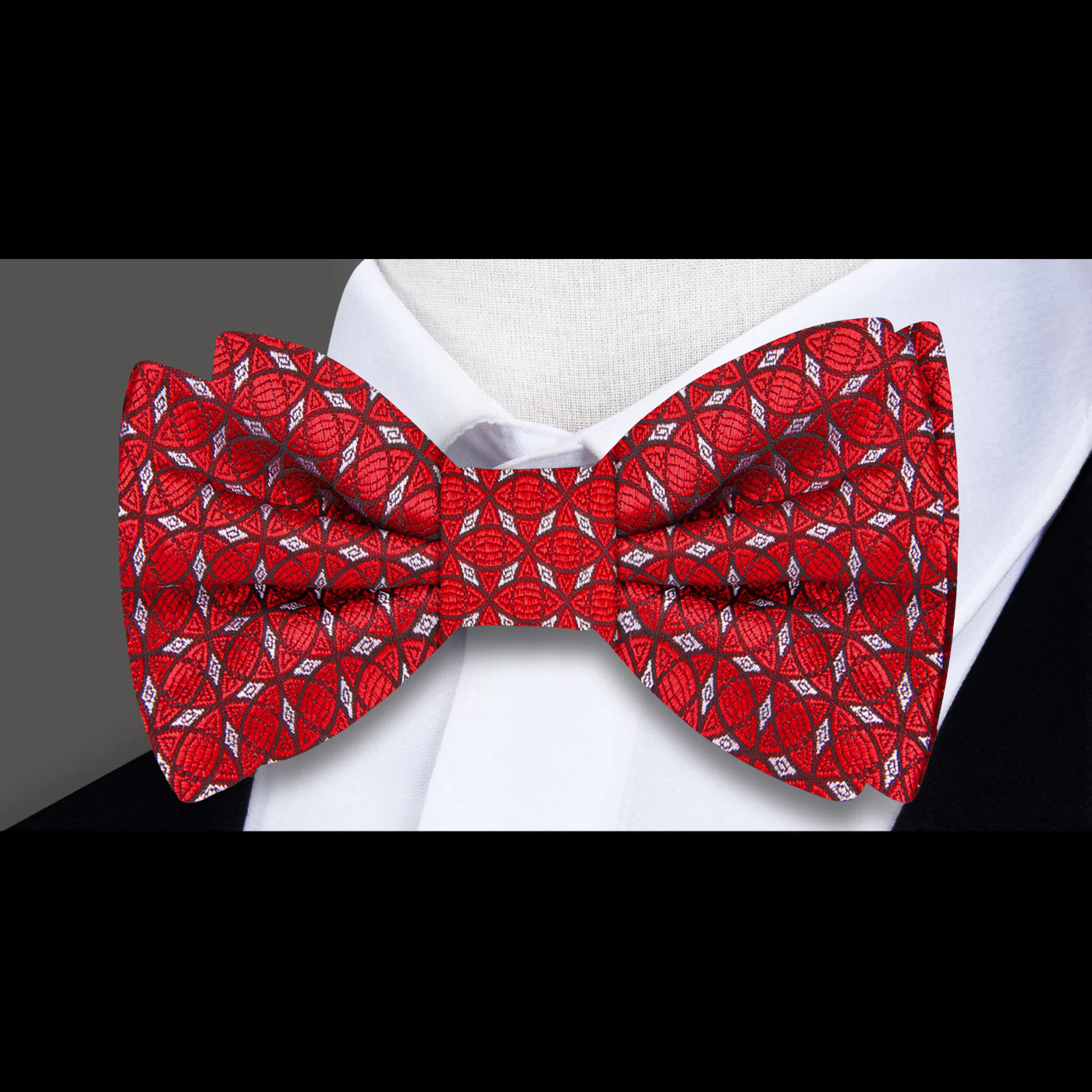 Pre-tied version of the crimson & slate bow tie displayed with a matching pocket square.
