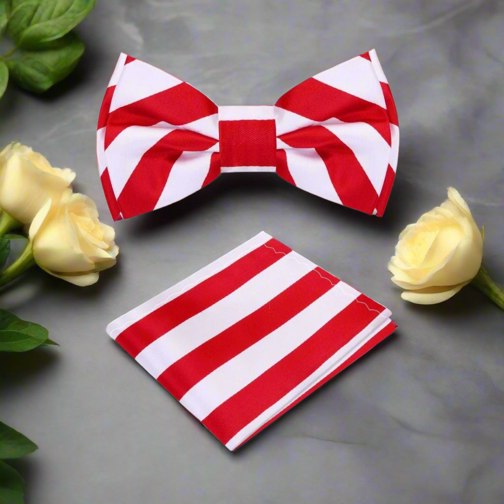 Red and white stripe silk bow tie styled with a navy blue suit