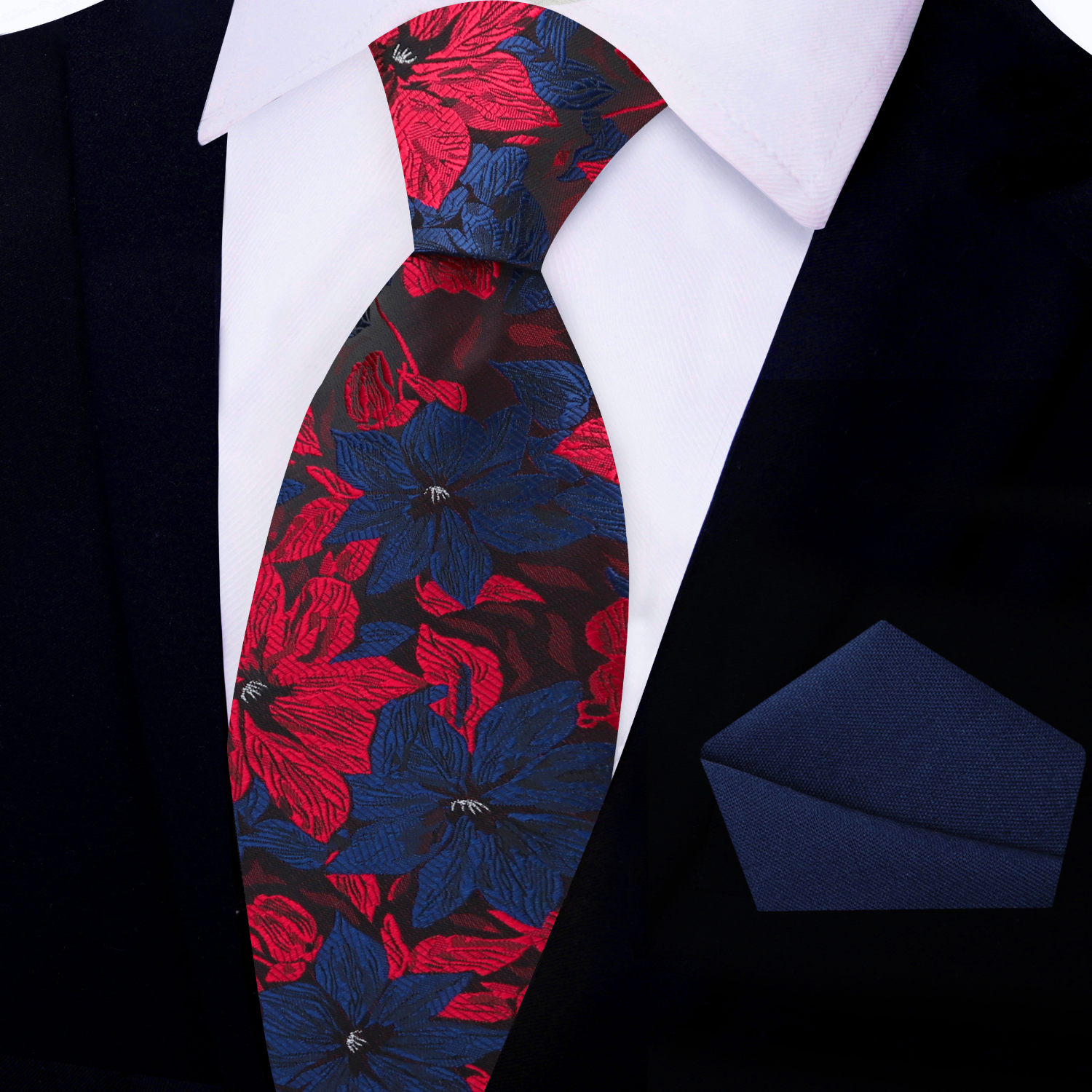 Close-up view of the Vibrant Hibiscus Floral Silk Necktie showcasing its intricate design and rich colors.