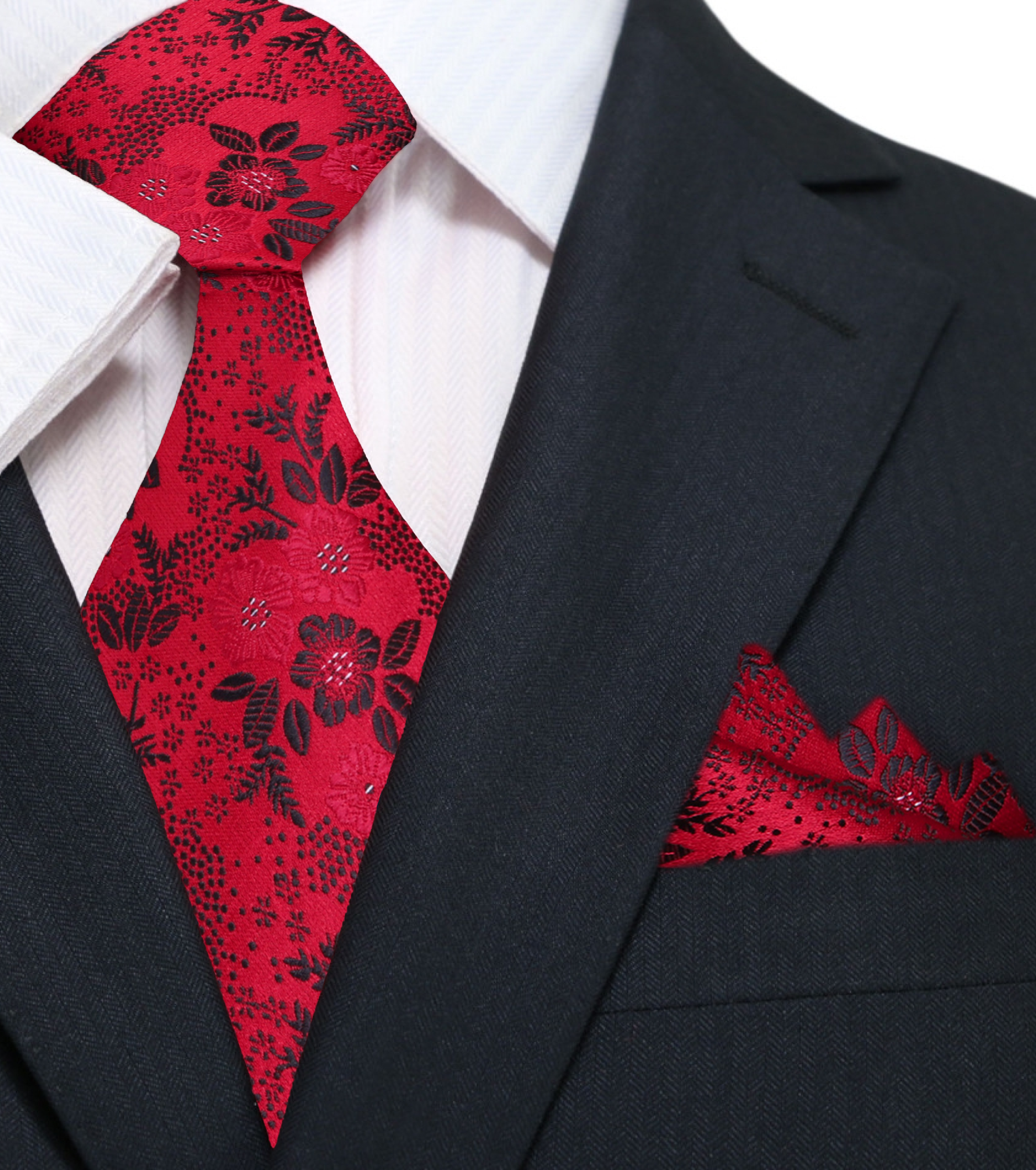 Man wearing floral necktie with a white shirt and navy suit for a wedding