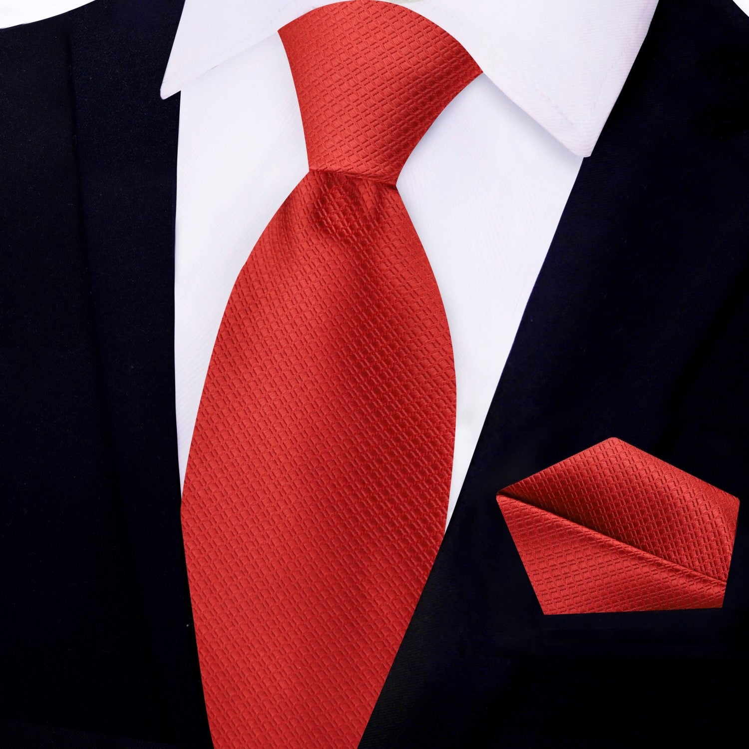 Folded red necktie with matching pocket square—perfect for formal occasions