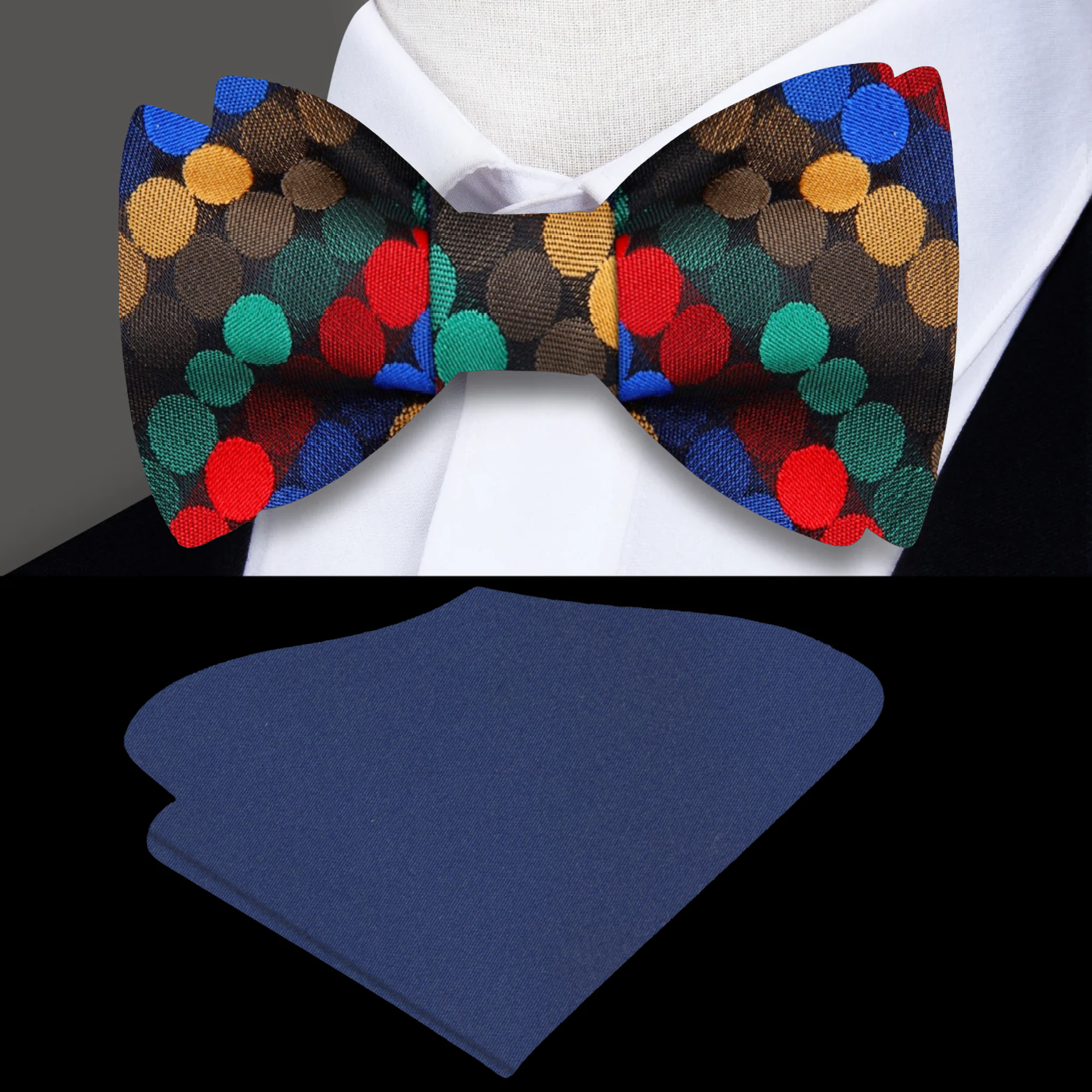 Close-up of vibrant polka dot self-tie bow tie in silk, showing red, blue, and orange dots on purple fabric