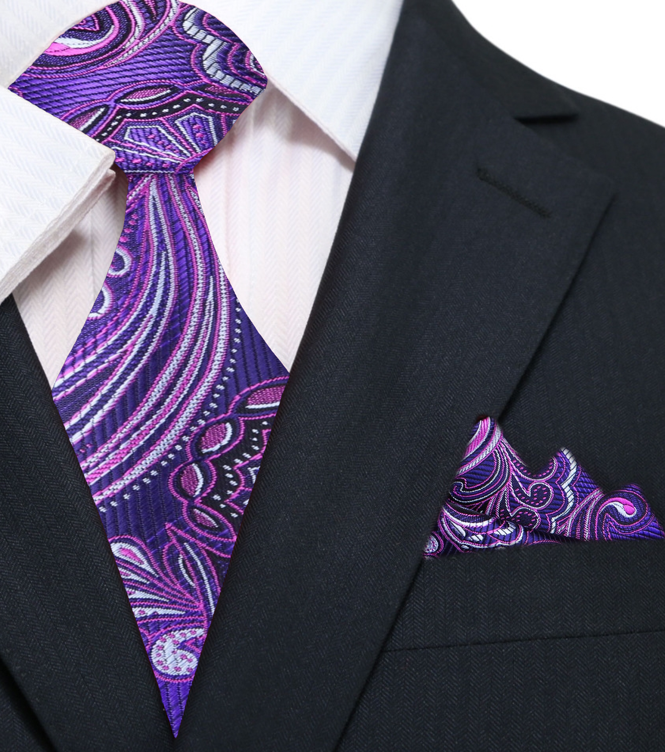 Burgundy paisley silk necktie displayed on a tailored suit, showing intricate patterns.