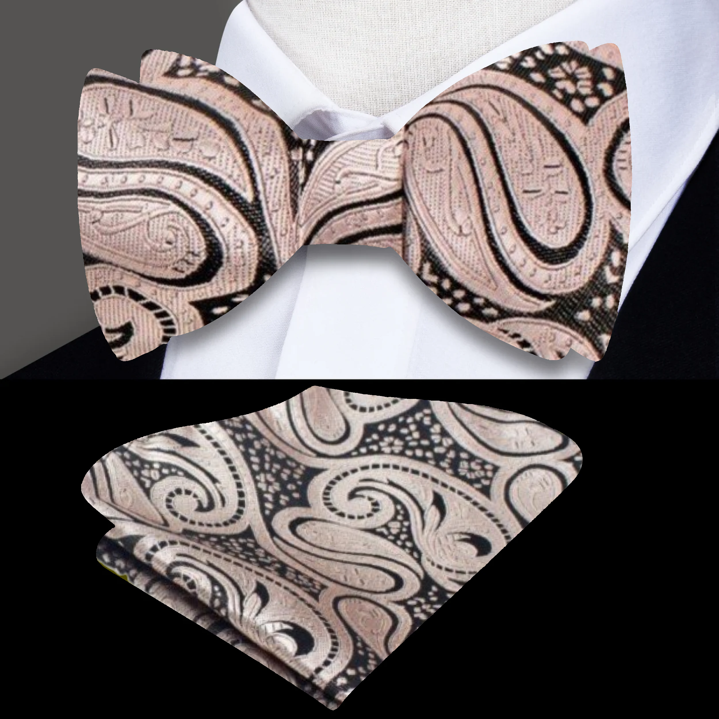 Model wearing a black and blue paisley bow tie at a formal wedding event.