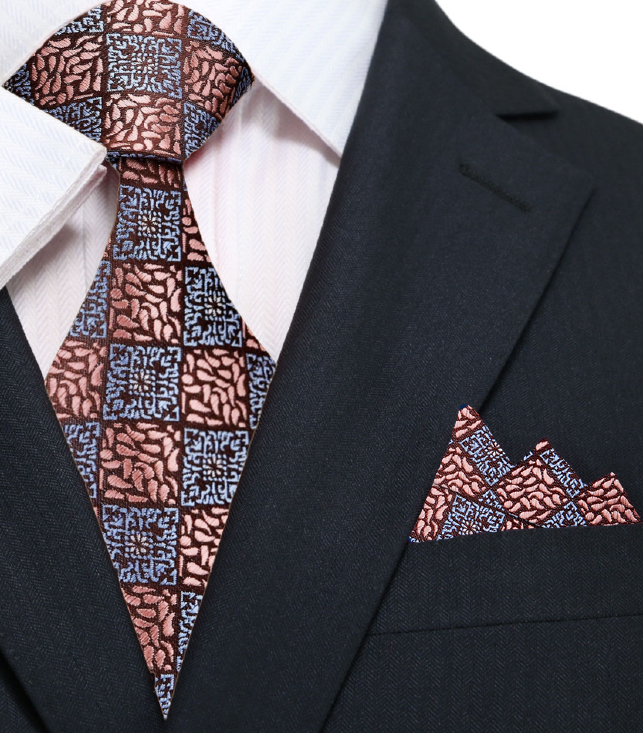 Light blue and dark blue geometric tie styled against a crisp white shirt for business meetings.