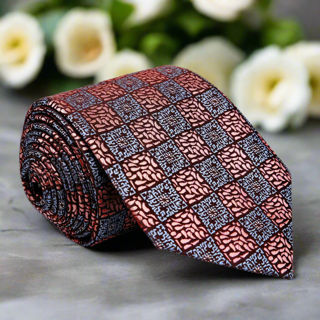 Close-up of the rose gold geometric necktie showcasing its intricate design.