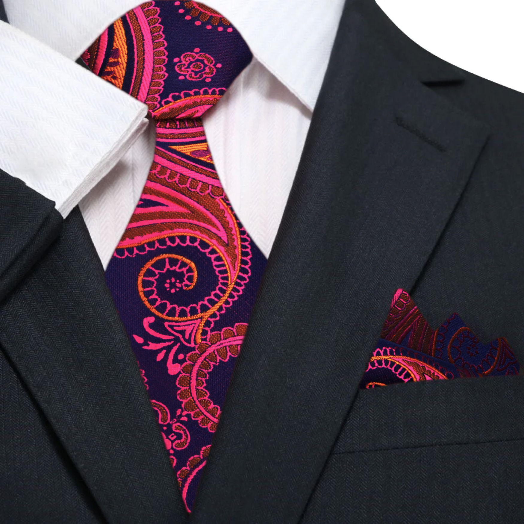 Model wearing a paisley silk tie with gold pattern paired with a white dress shirt