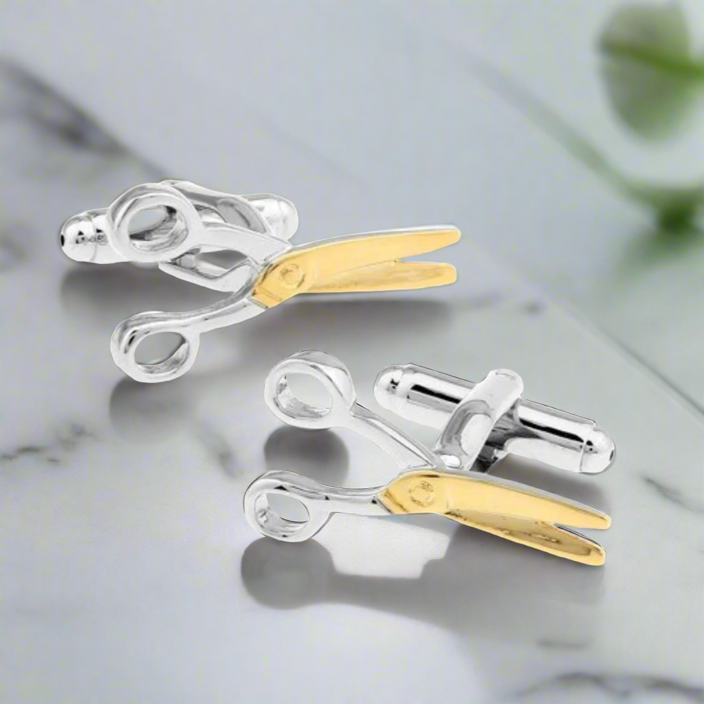 Close-up of creative scissor cufflinks highlighting their intricate design and craftsmanship.