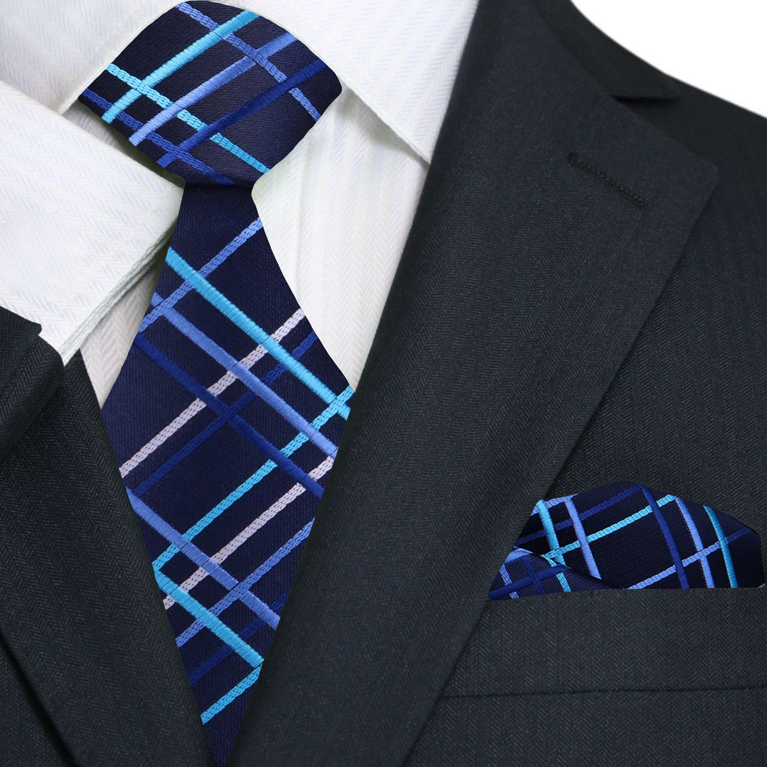 Man wearing Legion plaid silk necktie with a navy suit at a wedding