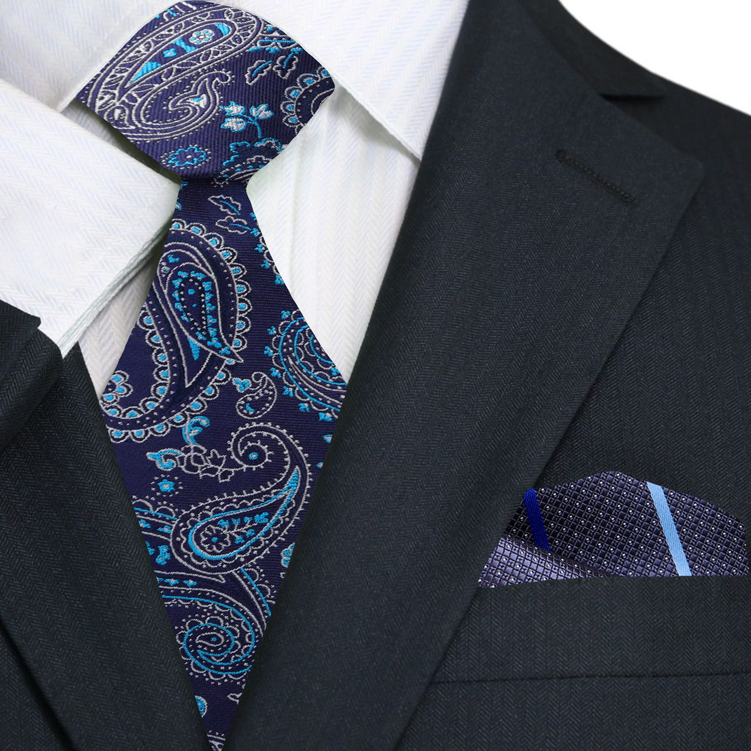 Close-up of detailed paisley pattern on a navy blue silk tie for weddings