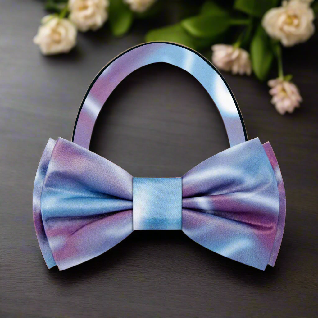 Close-up of a luxury silk bow tie with abstract pattern, ideal for formal wear