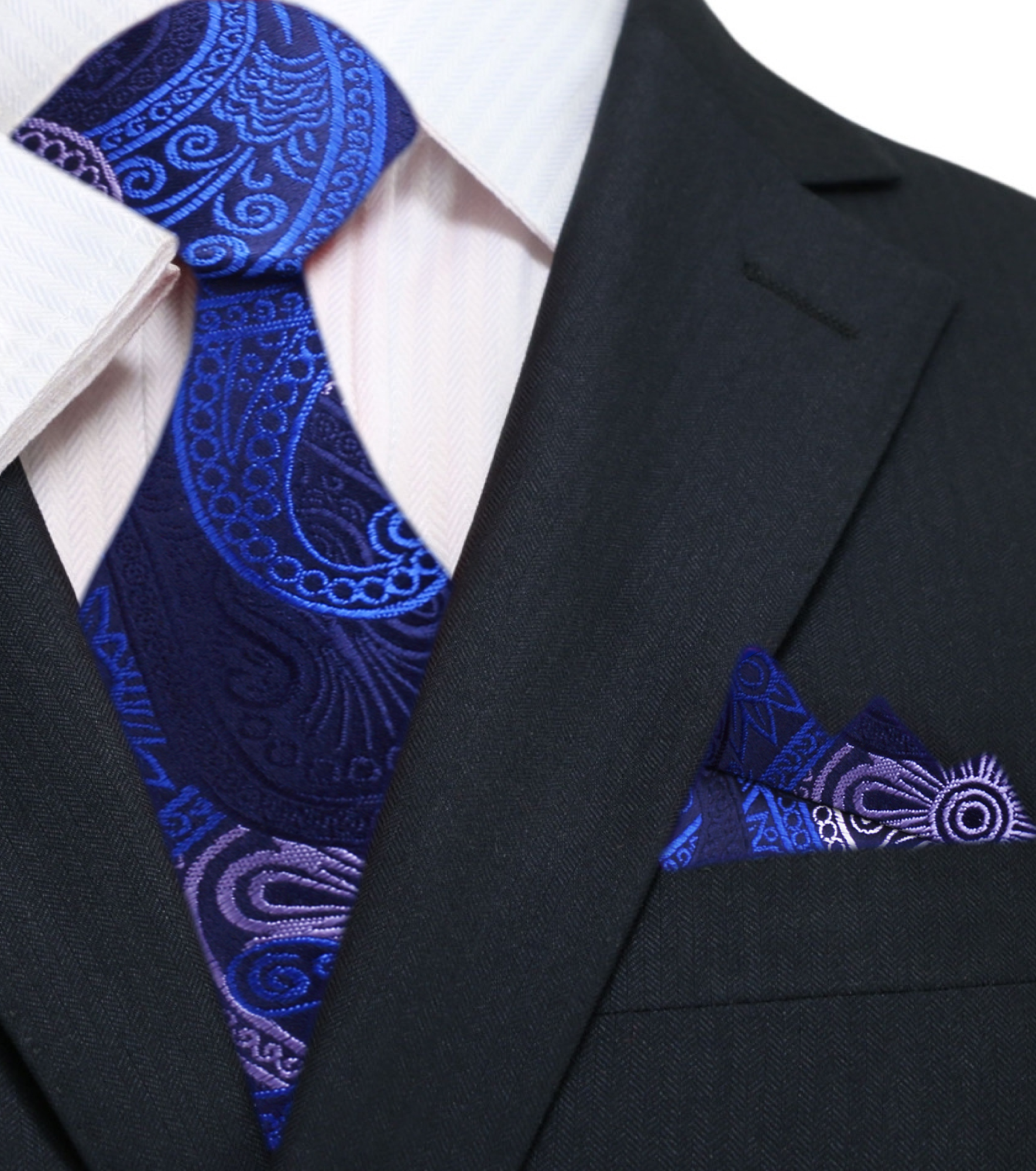 Man wearing the blue paisley tie at a wedding, perfectly paired with a navy suit.