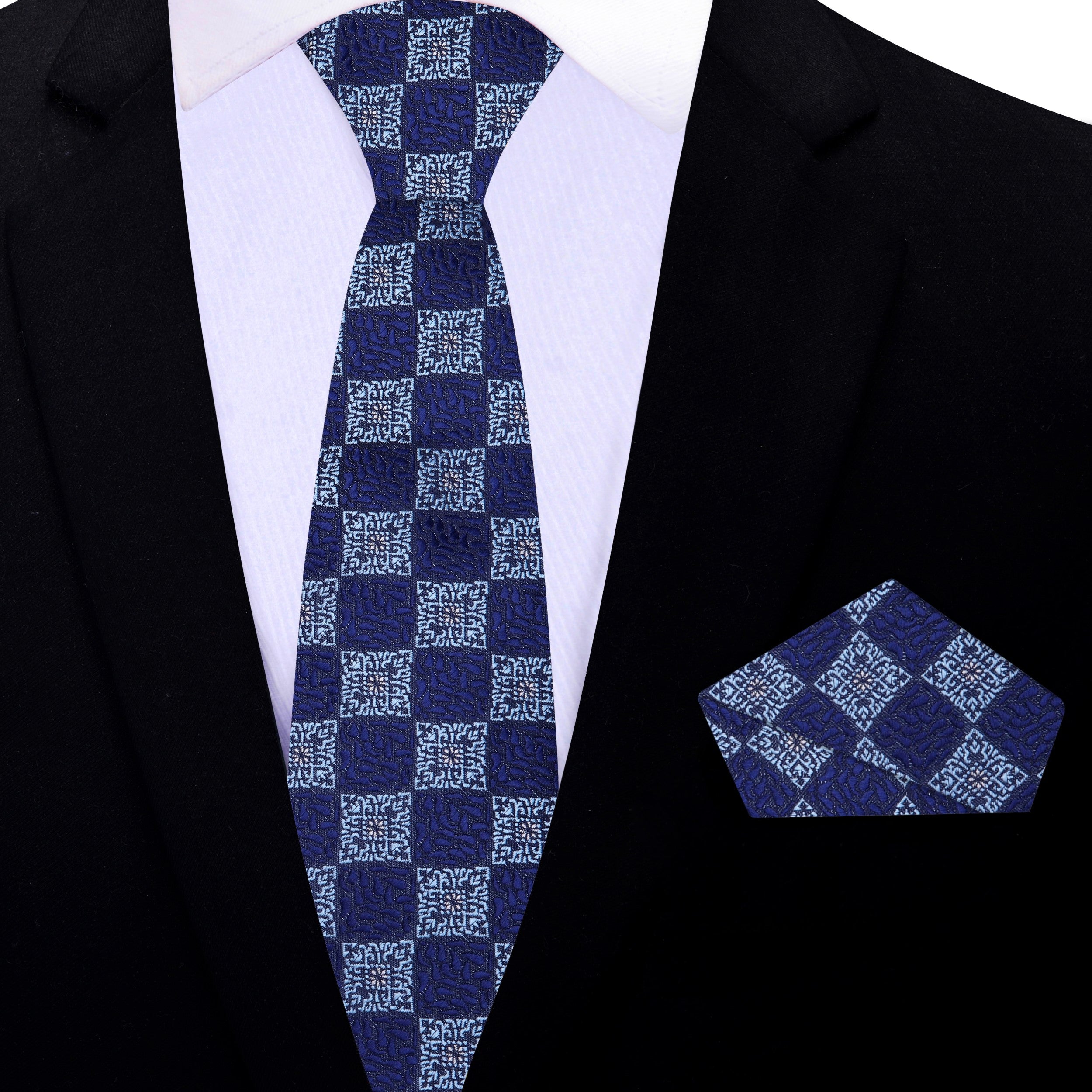 Elegant silk necktie featuring a blue geometric pattern for formal events
