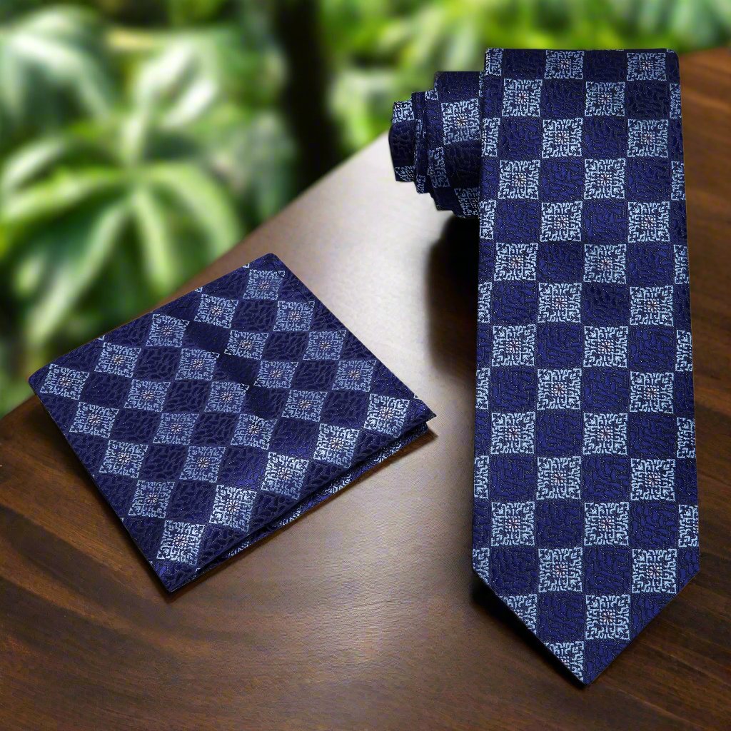 Front view of dark blue geometric silk necktie for men