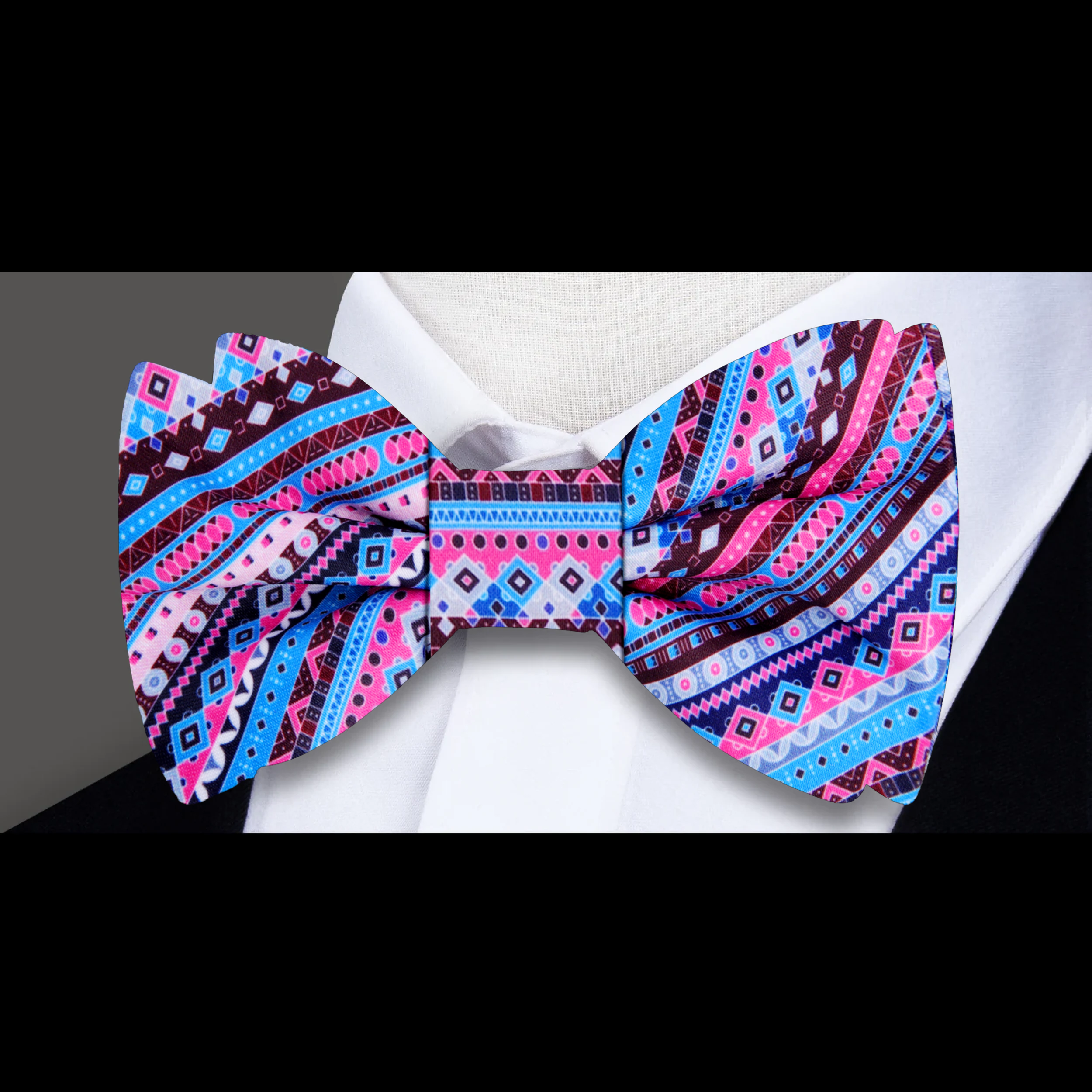 Elegant silk bow tie with vibrant colors and modern geometric design