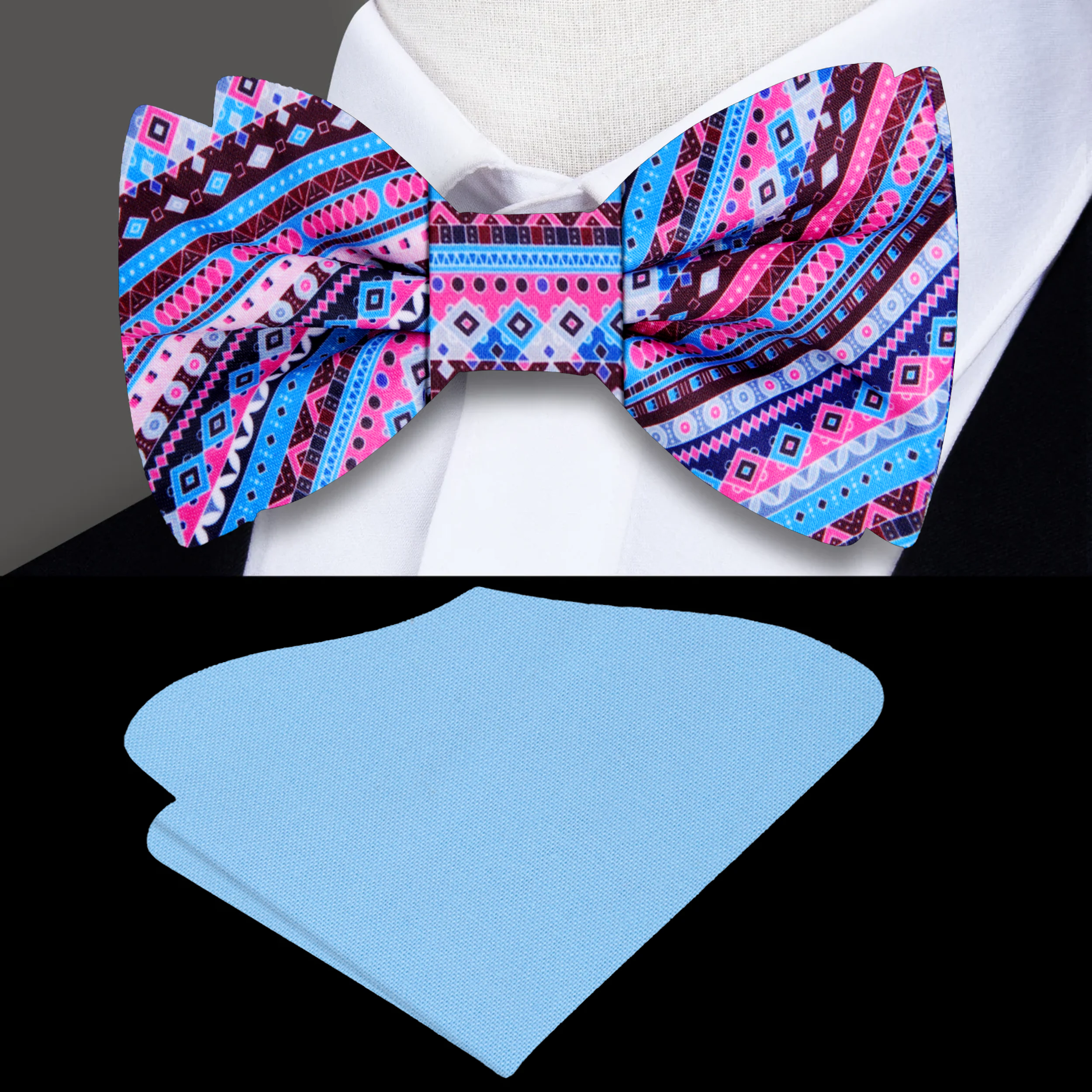 Close-up of blue and pink geometric silk bow tie with detailed pattern