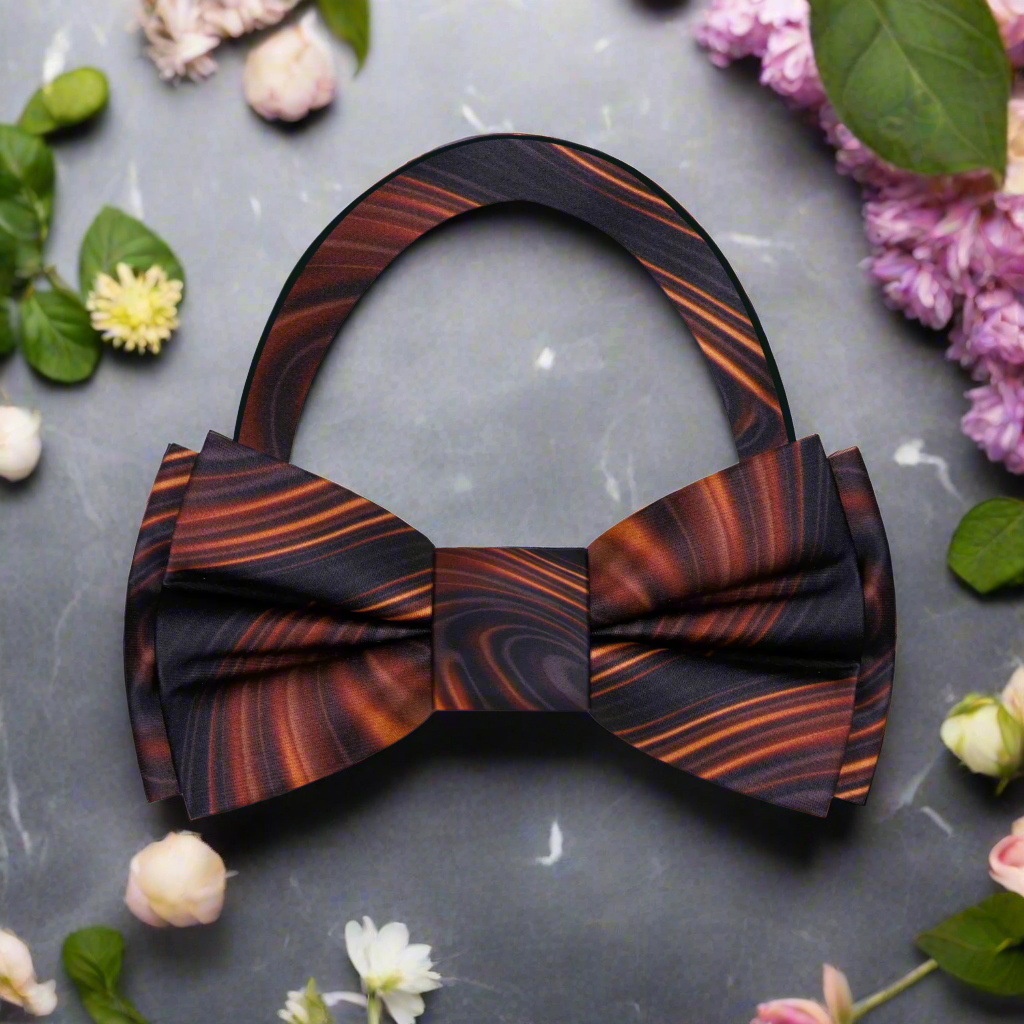 Silk bow tie with swirling caramel design for formal attire