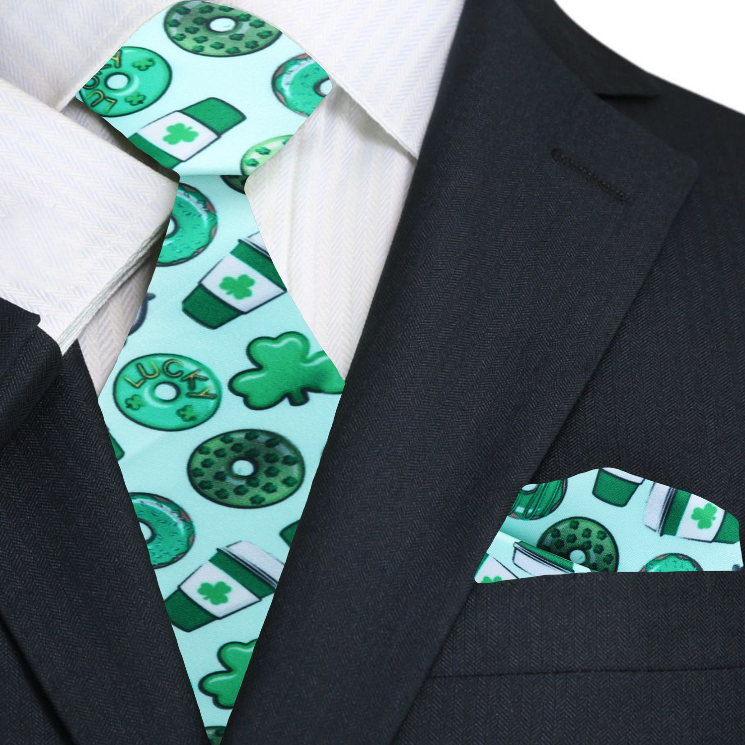 Man wearing a green silk tie with holiday-themed patterns at a party