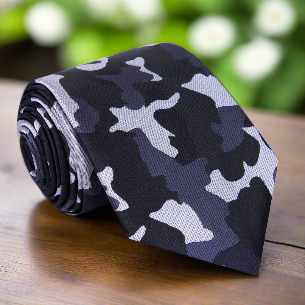 Close-up view of the urban camouflage silk tie showcasing its unique fleck pattern.