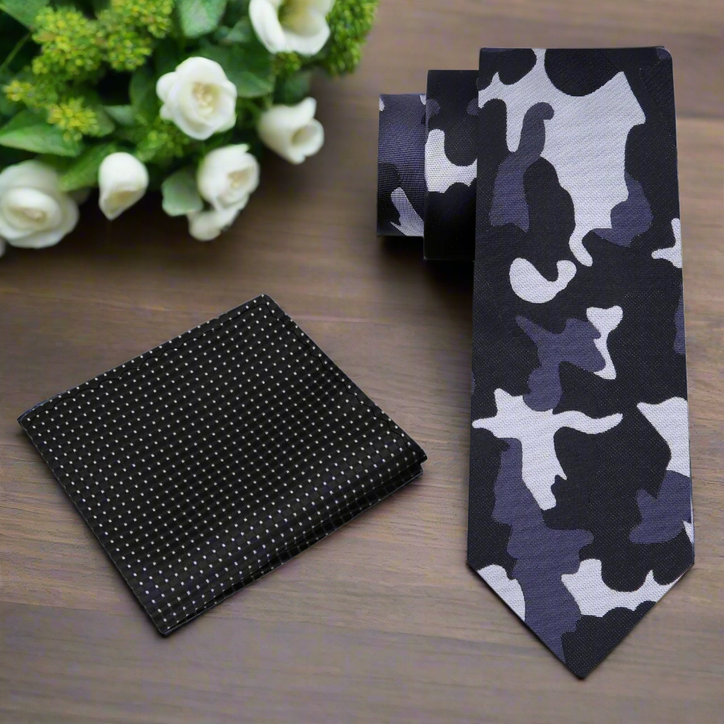 Silk tie paired with a classic black suit for an elegant look at a formal event.