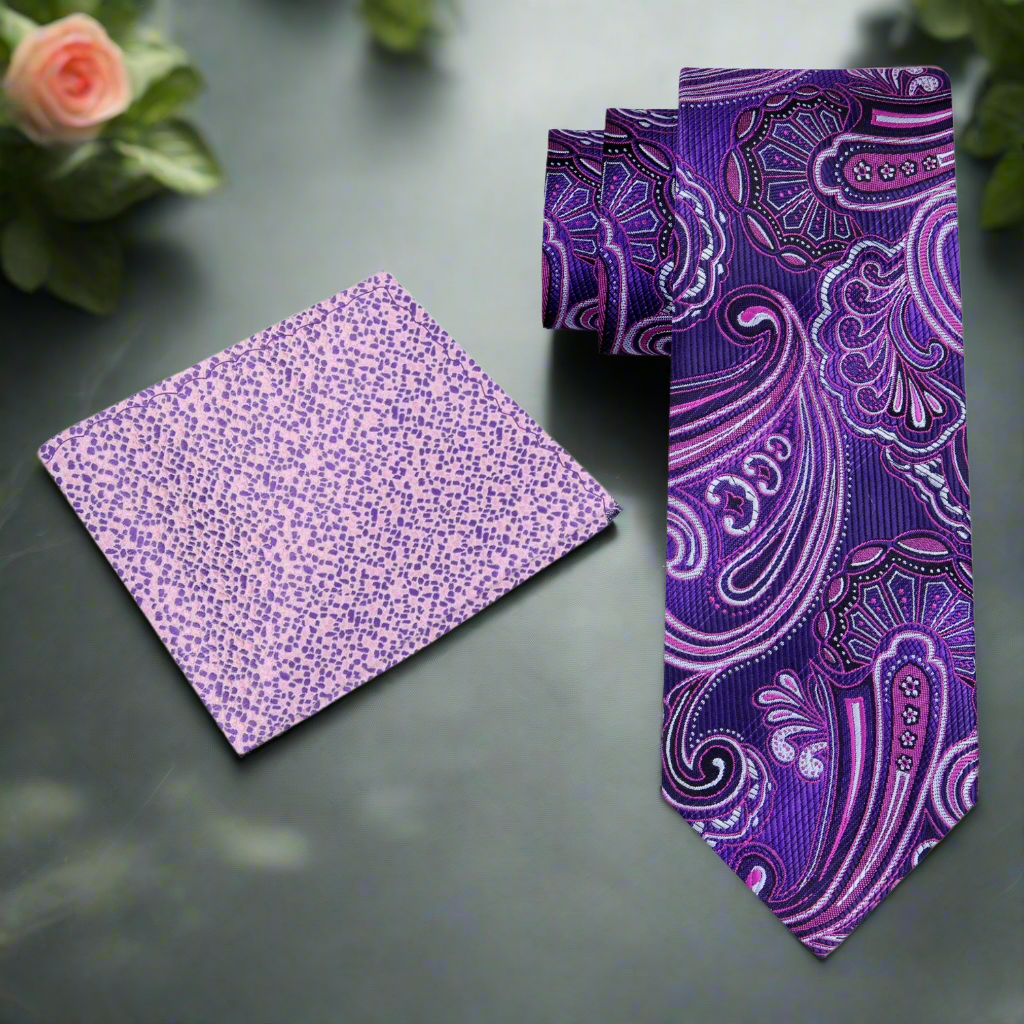 Purple silk necktie worn with a white dress shirt, perfect for weddings.