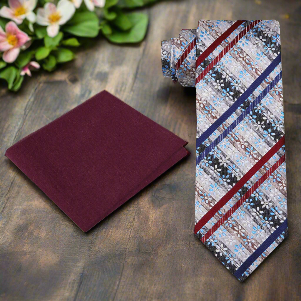 Close-up of silk texture and striped floral pattern for a sophisticated mens tie.