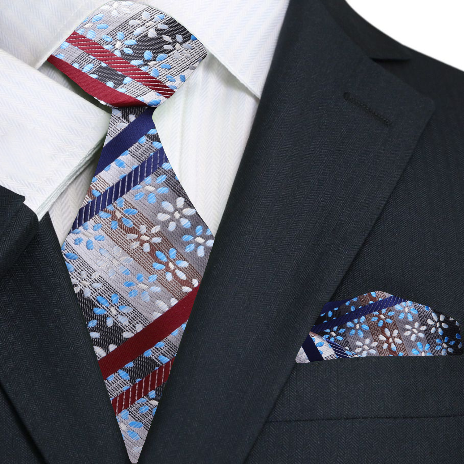 Front angle of Namje silk tie showcasing red, blue, and white floral stripes.