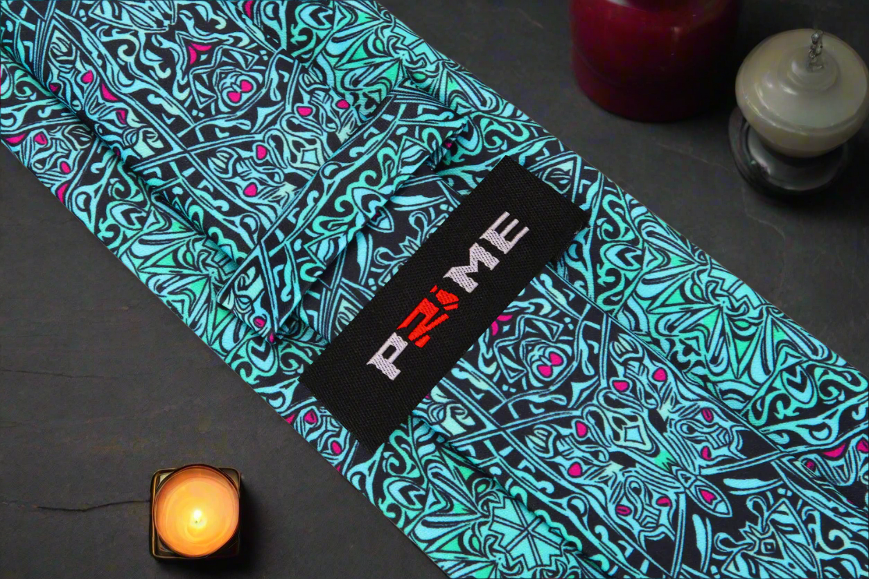 Artisan Abstract Silk Necktie styled with a grey suit, demonstrating its versatility for business meetings.