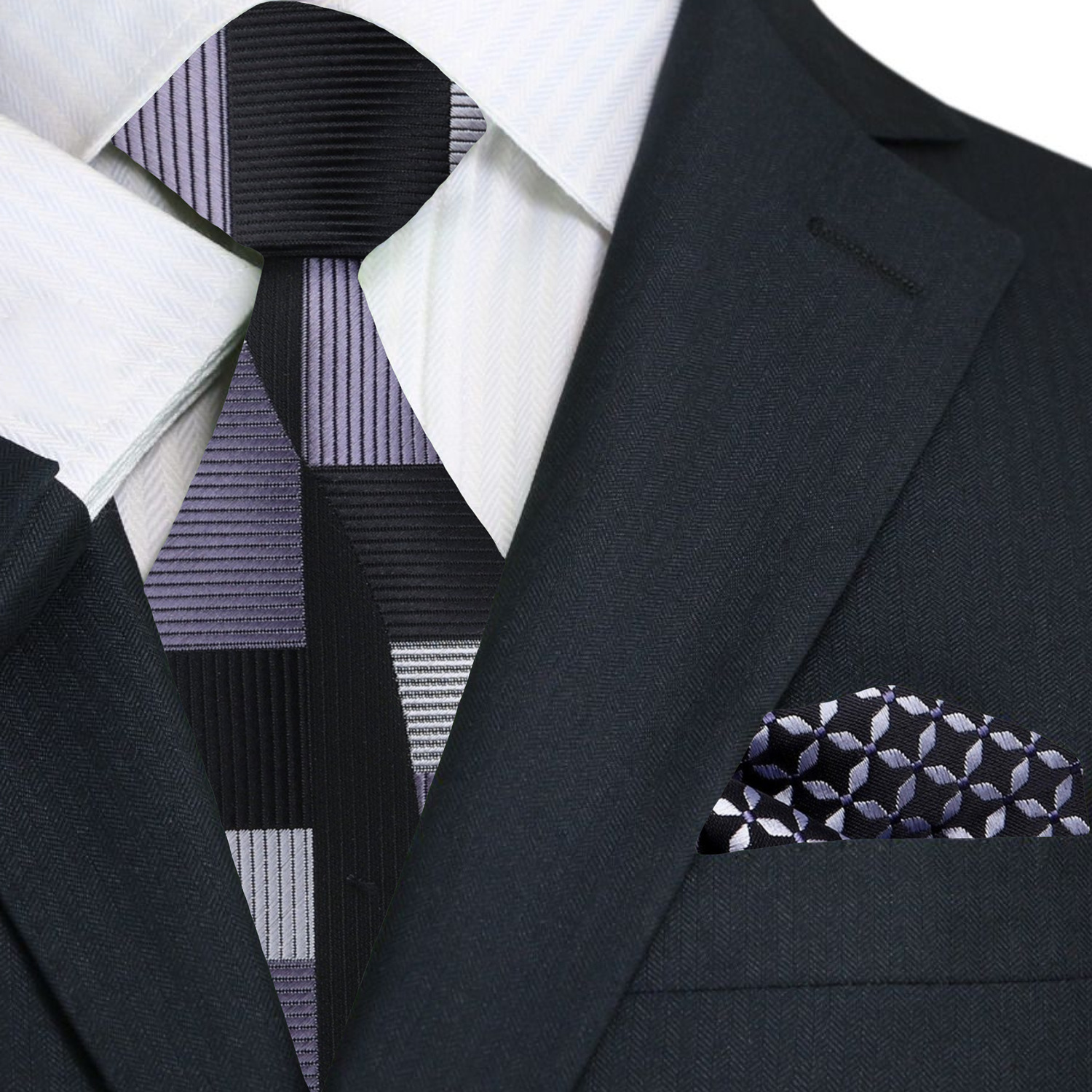 Man wearing a luxury mens tie and pocket square set at a networking event