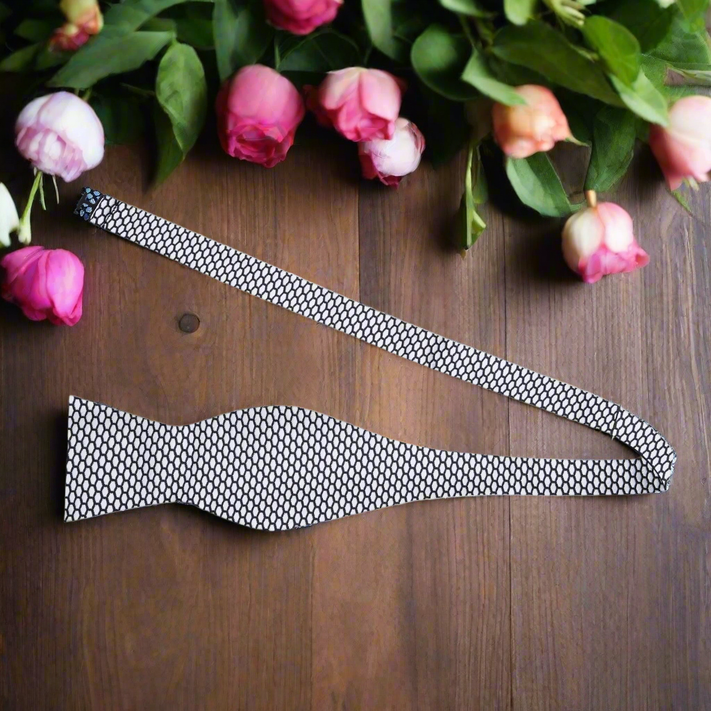 Close-up of the bow ties detailed geometric design