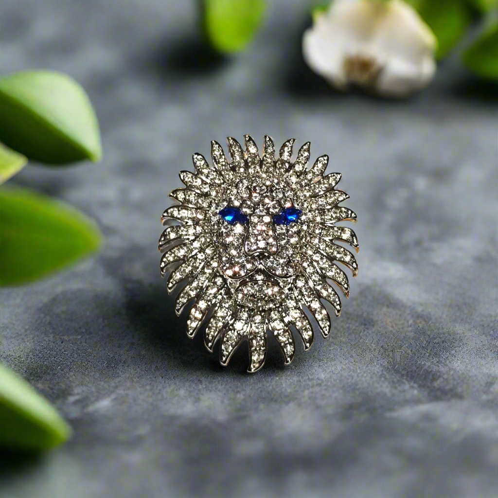 Majestic lion head lapel pin worn on a formal suit, highlighting its elegance and style.
