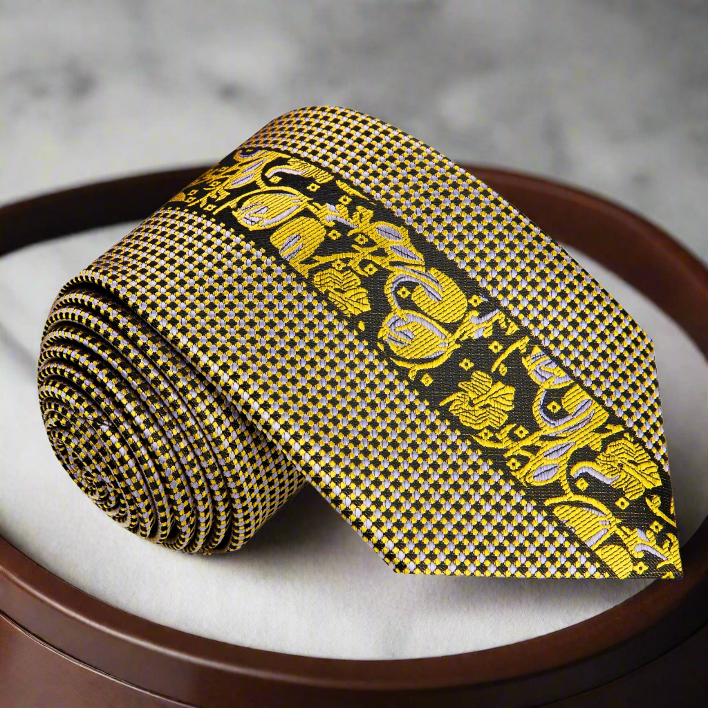 Close-up view of the elegant floral silk necktie with gold accents, showcasing intricate designs and colors.