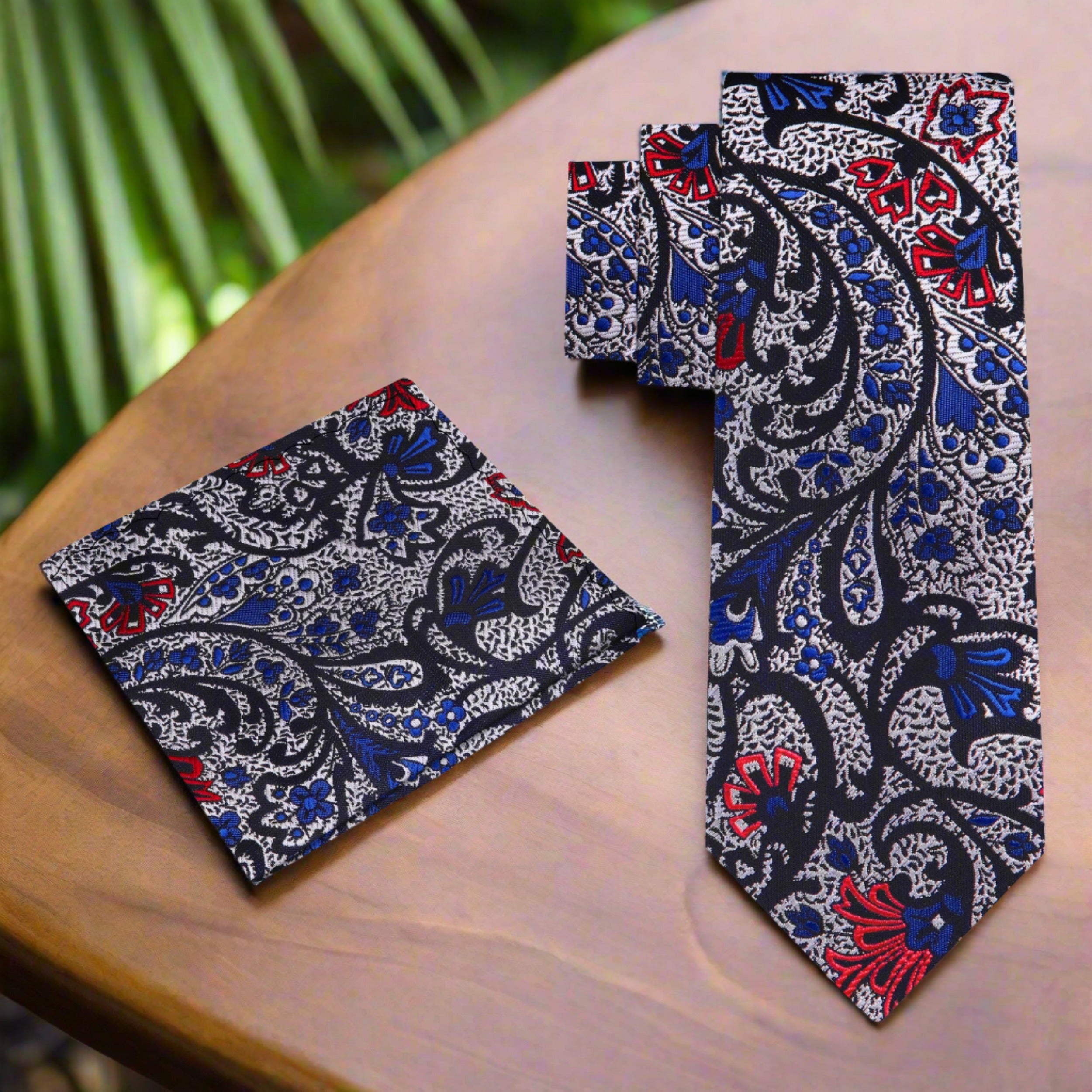 Close-up of luxury paisley silk necktie with intricate patterns