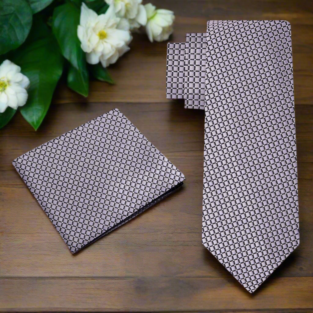 Close-up of the elegant silver geometric necktie showcasing its premium silk fabric and subtle pattern.