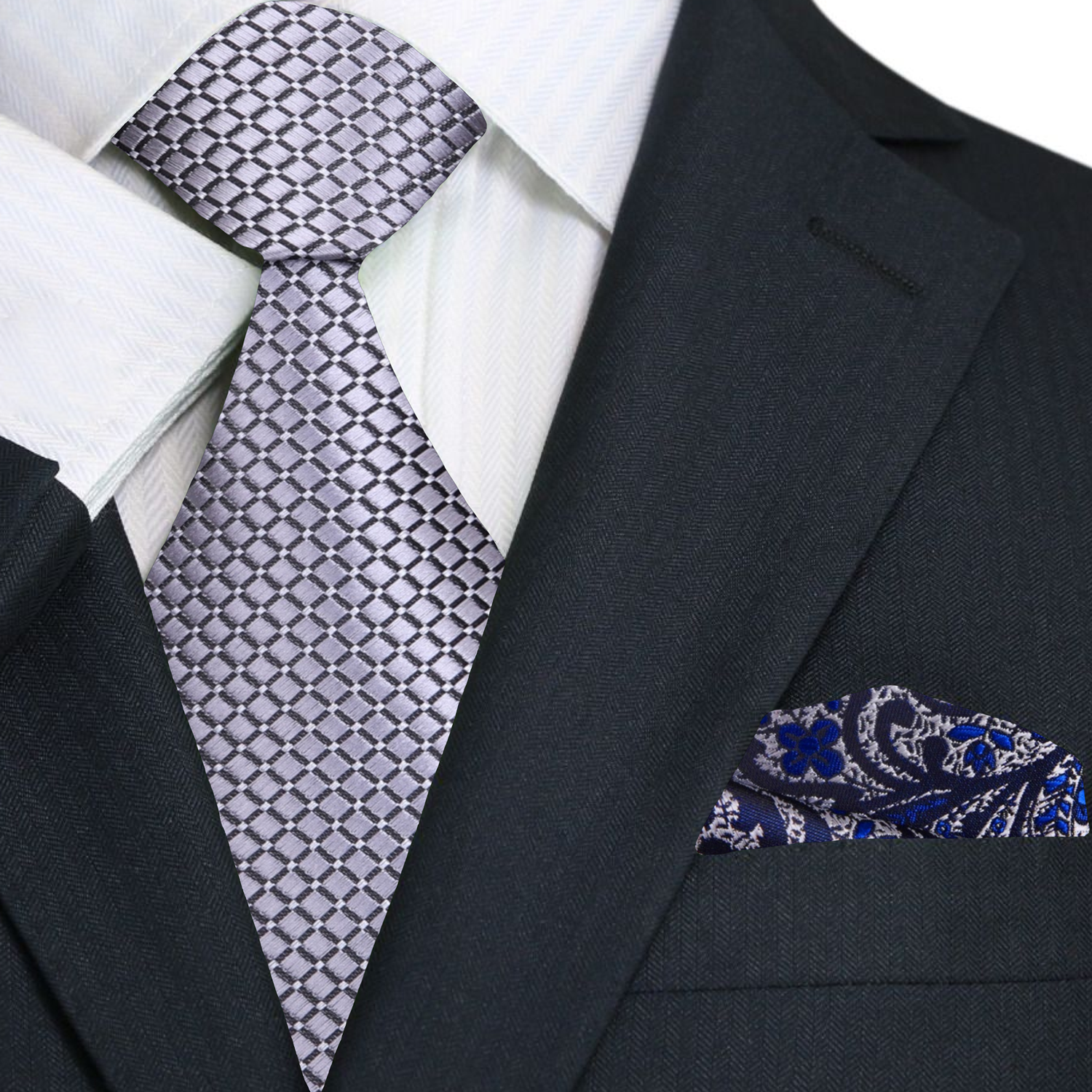 A model wearing the elegant silver geometric necktie paired with a crisp white dress shirt for a formal event.